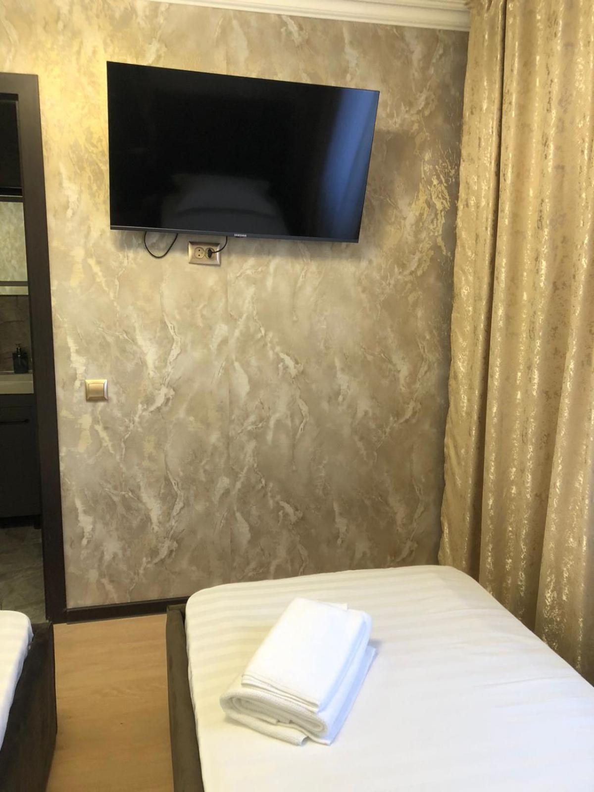 Hotel Lion อัลมาตี ภายนอก รูปภาพ